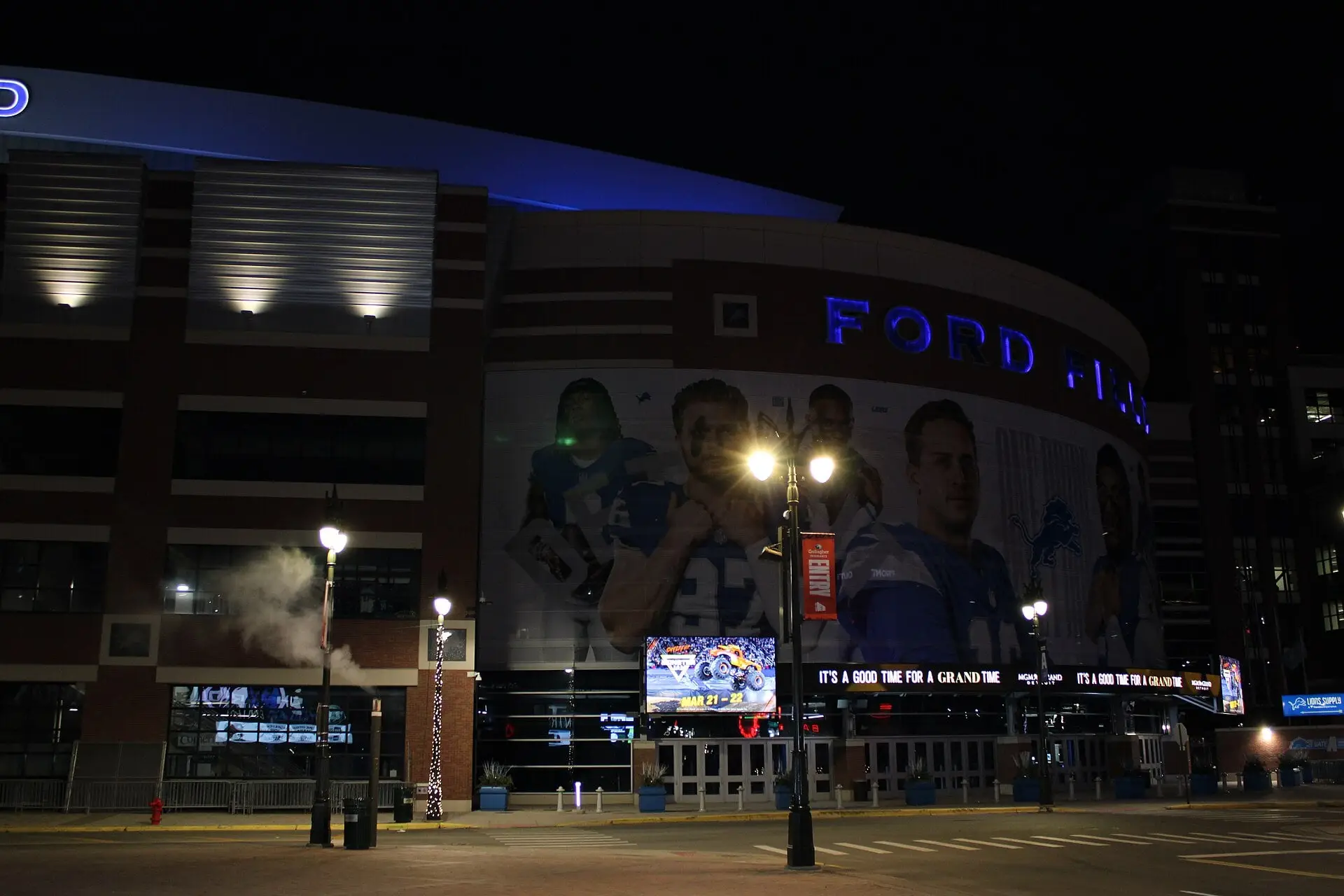 Ford Field's brick and glass exterior in downtown Detroit on a December day