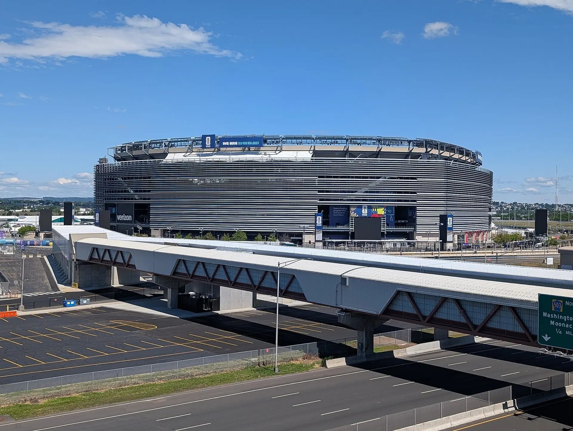Exterior of MetLife Stadium in its 2026 FIFA World Cup configuration, seen from a parking deck at American Dream, June 2026
