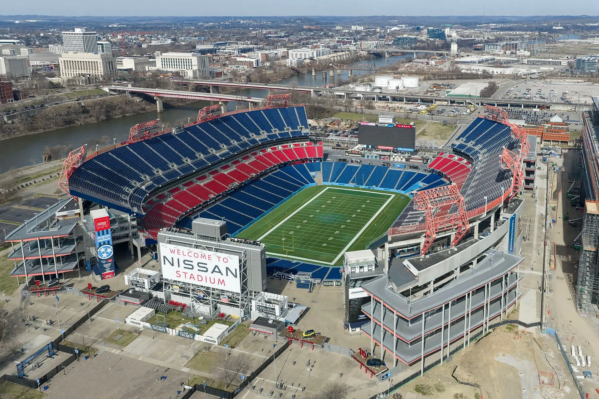 Aerial view of Nissan Stadium beside the Cumberland River, photographed in February 2026
