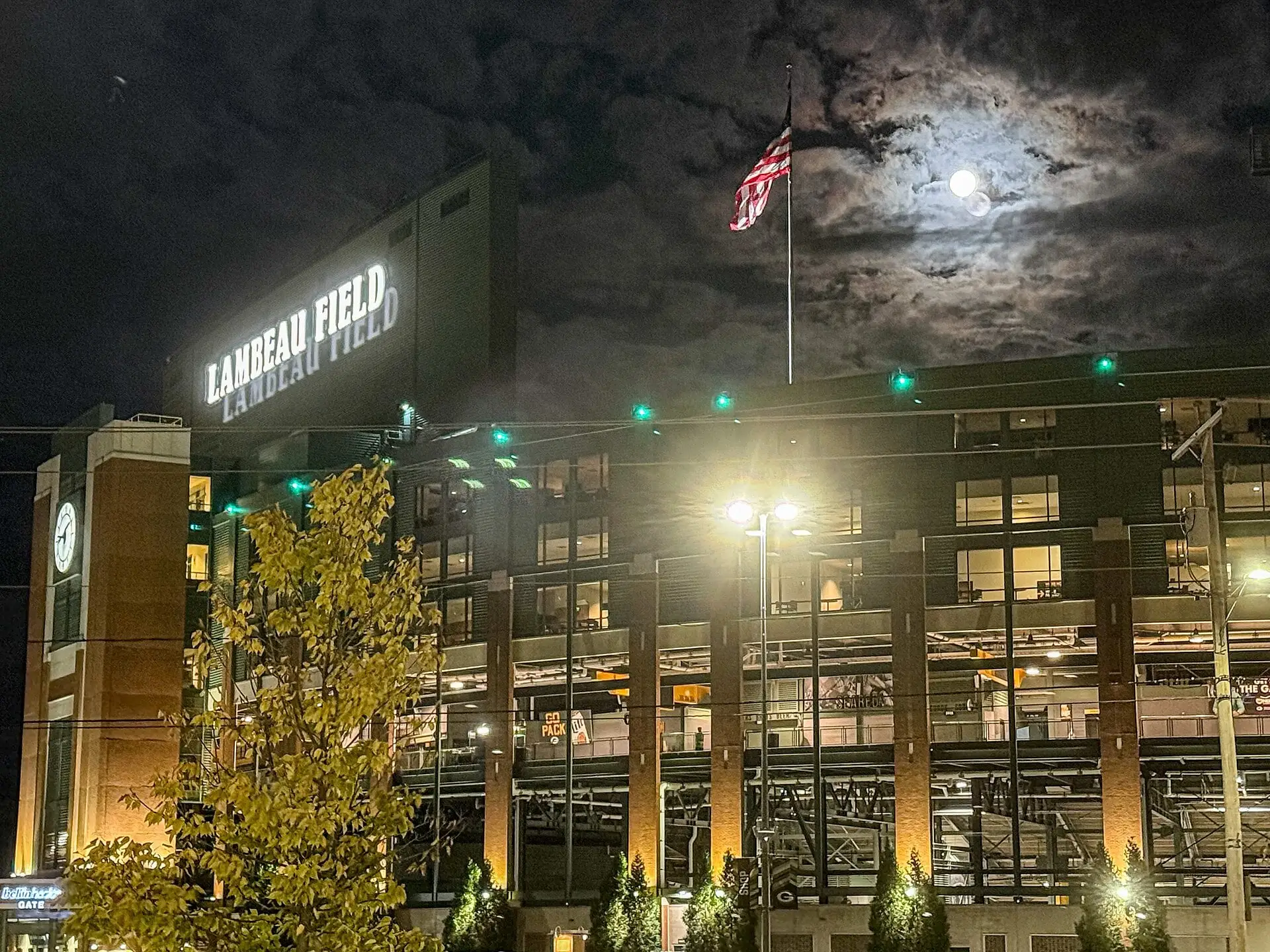 Lambeau Field lit up at night the evening before the 2025 season opener
