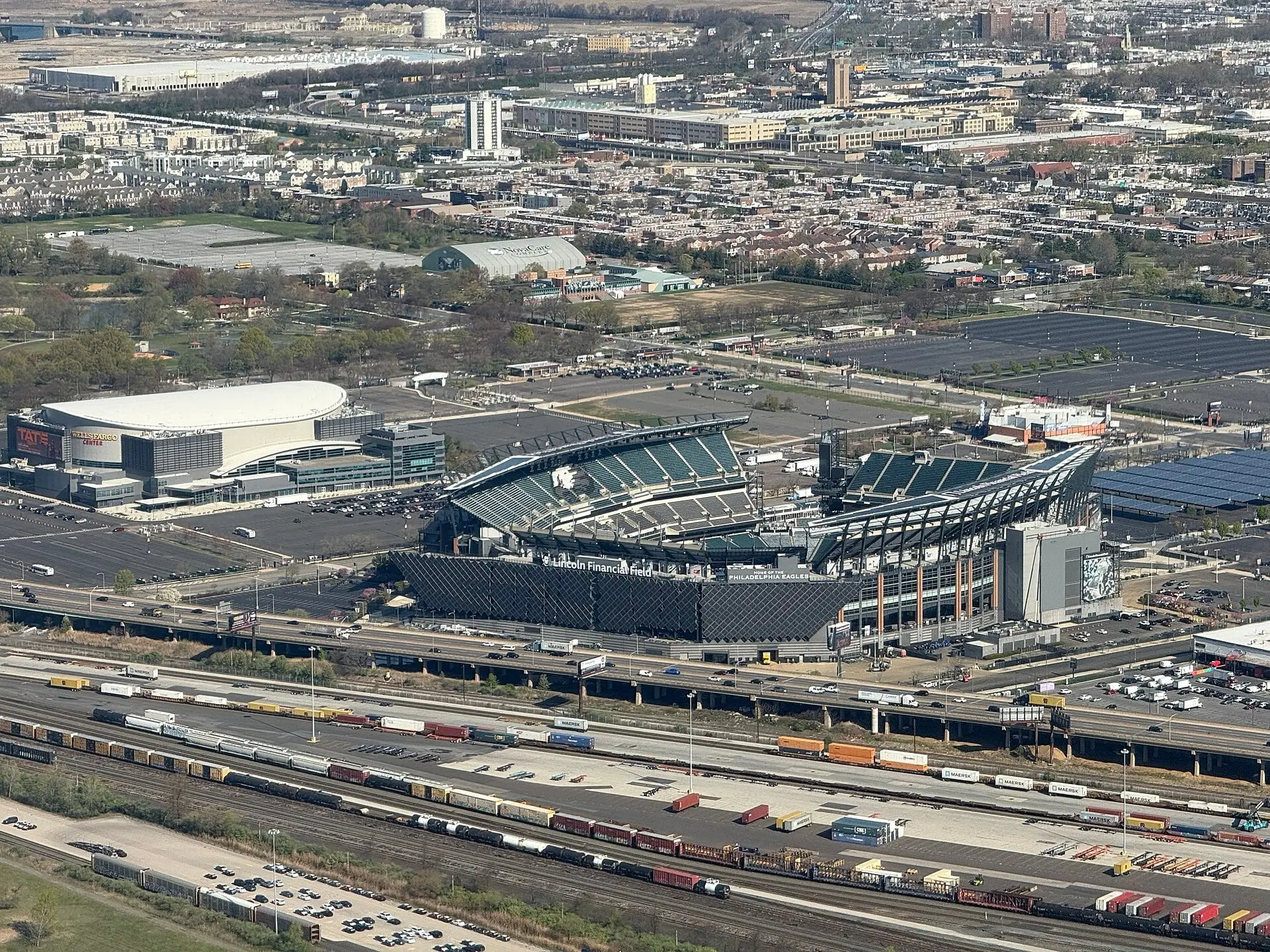 Lincoln Financial Field and the neighboring Wells Fargo Center seen from a plane approaching Philadelphia International Airport, April 2025