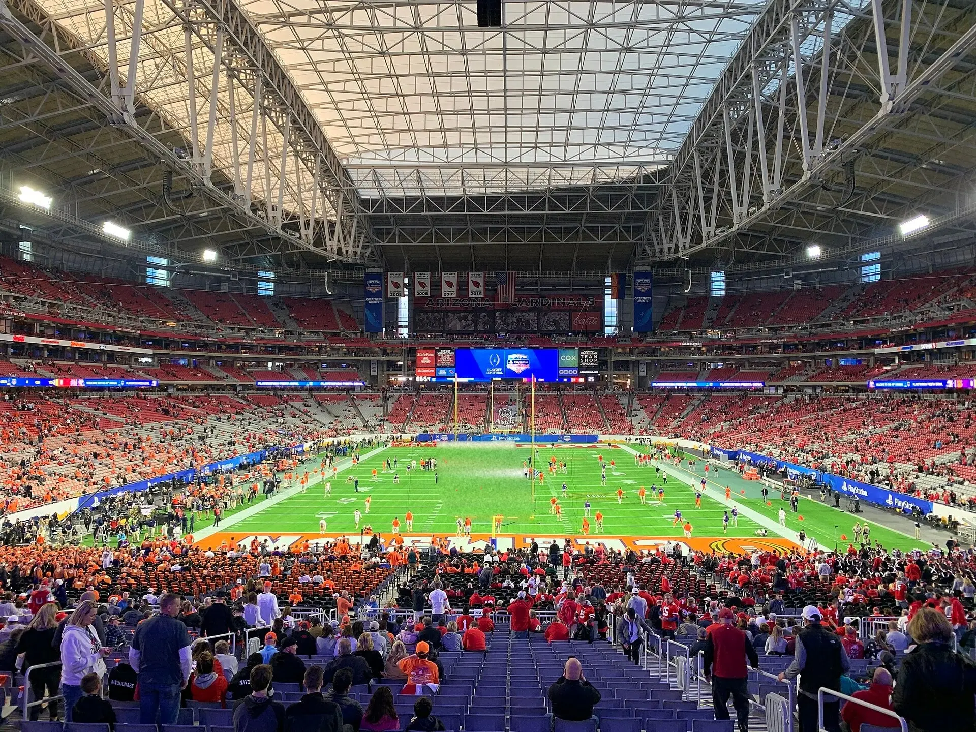 Seating bowl and field of State Farm Stadium before the 2019 Fiesta Bowl, seen from the south end